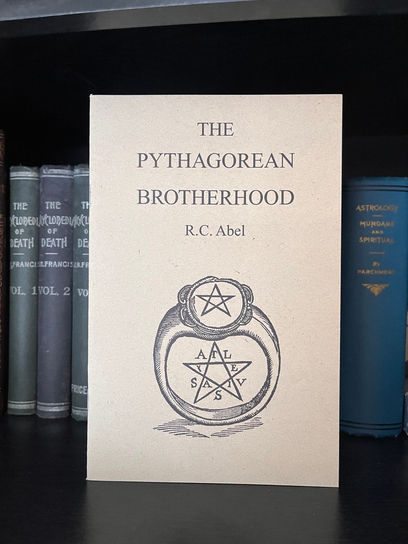 May include: A brown book titled "The Pythagorean Brotherhood" by R.C. Abel. The cover features a black and white illustration of a ring with a five-pointed star.