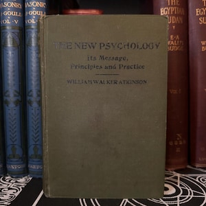 May include: A green hardcover book titled "The New Psychology: Its Message, Principles and Practice" by William Walker Atkinson.