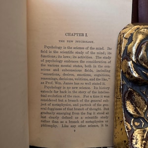 May include: A page from a book titled "The New Psychology" with text discussing the history and scientific study of the mind.