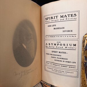 May include: A vintage book cover with the title "Spirit Mates: Their Origin and Destiny" by J.M. Peebles. The book also includes a symposium by forty noted writers on the topic of spirit mates, their pre-existence, earth pilgrimages, and reunions in spirit-life.