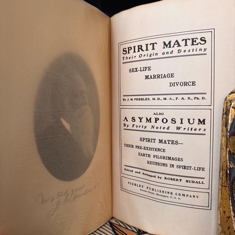 May include: A vintage book cover with the title "Spirit Mates: Their Origin and Destiny" by J.M. Peebles. The book also includes a symposium by forty noted writers on the topic of spirit mates, their pre-existence, earth pilgrimages, and reunions in spirit-life.