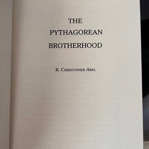 May include: The cover of a book titled "The Pythagorean Brotherhood" by R. Christopher Abel.