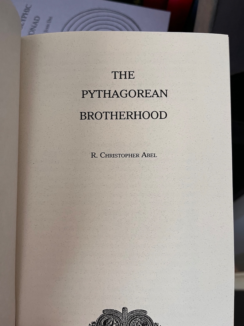 May include: The cover of a book titled "The Pythagorean Brotherhood" by R. Christopher Abel.