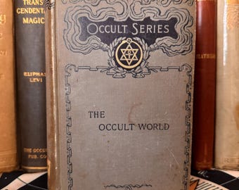 May include: A vintage book titled "The Occult World" from the "Occult Series" with a gold star of David symbol on the cover.