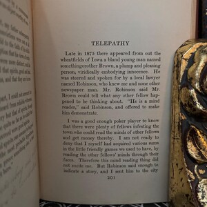 May include: A page from a vintage book titled "Telepathy" with text discussing a man named Brown who could read minds. The text describes Brown as a "mind reader" and discusses how he was able to demonstrate his abilities to the author.