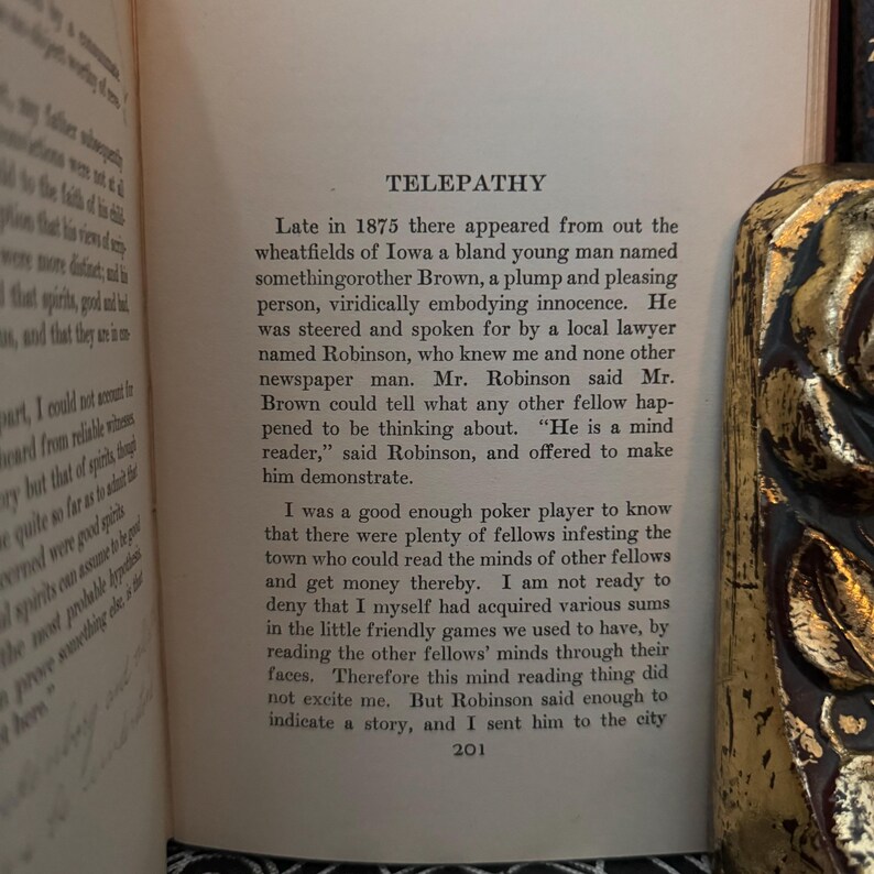 May include: A page from a vintage book titled "Telepathy" with text discussing a man named Brown who could read minds. The text describes Brown as a "mind reader" and discusses how he was able to demonstrate his abilities to the author.
