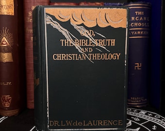 May include: A vintage green hardcover book with gold lettering titled "God, The Bible, Truth and Christian Theology" by Dr. L.W. de Laurence.