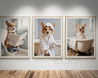 May include: Three framed prints of a corgi dog in a bathroom setting. The first print shows the dog sitting on a toilet reading a newspaper. The second print shows the dog wearing a white bathrobe. The third print shows the dog sitting in a bathtub with bubbles.