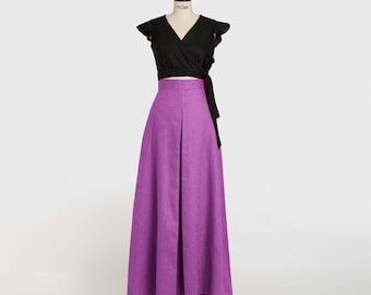 Falda larga de lino color orquídea, falda de talle alto con corte en A y bolsillos.