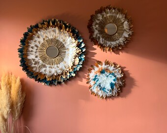 Trio of boho-style Juju Hats with 15cm mirrors, handmade gold raffia. Terracotta, teal, and white colors. Handmade wall decoration.