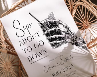 May include: A black and white invitation card with the text "Sips About To Go Down" and a skeleton hand holding a cocktail. The card also includes details for a "Costumes & Cocktails" event on October 31, 2025.