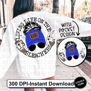 May include: A white sweatshirt with a graphic design of a woman wearing a blue baseball cap with the text "Hockey Mama" on it. The graphic is surrounded by a circle with the text "Living Life on the Bleachers". The sweatshirt also has a smaller graphic of the same woman on the pocket with the text "With Pocket Design".