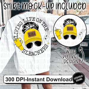May include: White sweatshirt with a graphic design of a woman with a bun wearing a yellow baseball cap with the word "Mama" on it. The graphic says "Living Life on the Bleachers".