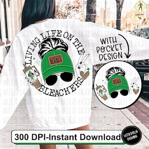 May include: A white sweatshirt with a green and black design that says "Living life on the bleachers" with a woman wearing a green baseball cap that says "Wrestling Mama". The design is also available as a pocket design.