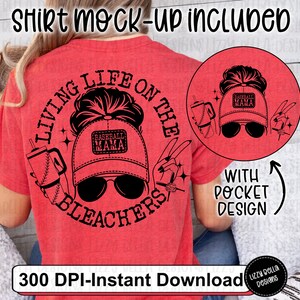 May include: Red t-shirt with a black graphic design that says "Living Life on the Bleachers" with a baseball cap and sunglasses. The graphic also includes a baseball cap with the text "Baseball Mama".