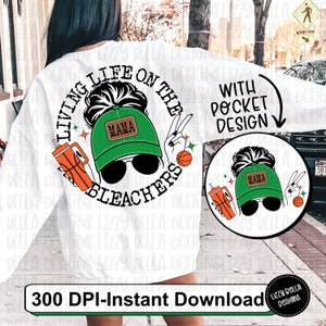 May include: A white sweatshirt with a graphic design that says "Living Life on the Bleachers" with a woman wearing a green baseball cap that says "Mama" on it. The design also includes a basketball, a drink, and peace signs. The sweatshirt also has a pocket design with the same graphic.