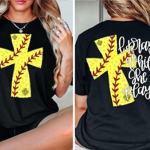 May include: Black t-shirt with a yellow softball cross design on the front and the text "I pray while she plays" on the back.