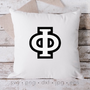 May include: A white pillow with a black outline of the Greek letter Phi, with a vertical line in the center.