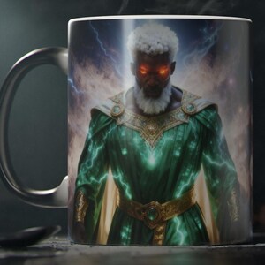 May include: A black coffee mug featuring a detailed illustration of a powerful figure with glowing red eyes, white hair, and a long white beard. The figure is wearing a green and gold robe with lightning effects. The background shows a stormy sky.