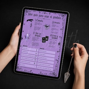 May include: A digital tablet displaying a purple instructional guide titled Mini guia para usar el péndulo, featuring text and icons for pendulum use, alongside a clear crystal pendulum hanging from a silver chain held to the side of the screen.