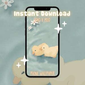 May include: A phone wallpaper featuring two yellow ducklings swimming in a blue pond with white flowers. The text "Instant Download 1080 x 1920 PHONE WALLPAPER" is displayed on the screen.