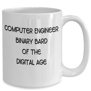 May include: White ceramic coffee mug with black text that reads "Computer Engineer Binary Bard of the Digital Age".