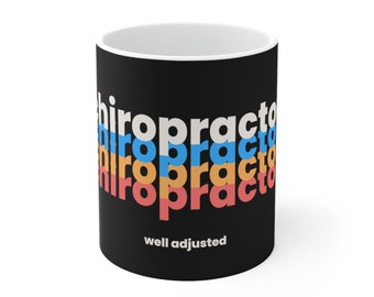 May include: Black coffee mug with the word "chiropractor" repeated four times in a stacked design with alternating colors of blue, orange, and red. The text "well adjusted" is printed below the stacked word.