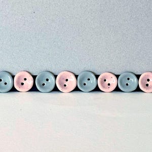 Pink and gray ceramic buttons