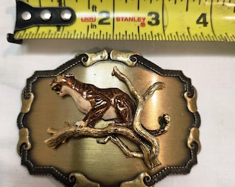 Hebilla de cinturón vintage Raintree Buckle & Jewelry Inc. – Leopardo en rama, fauna del oeste, tono bronce, 3.5"