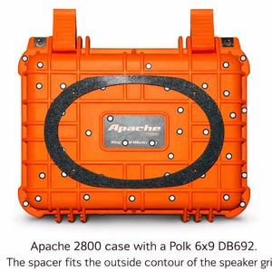 May include: An orange Apache 2800 case with a black oval spacer. The case has a textured surface and white circular accents. The text "Apache" is visible on the case.