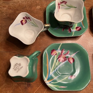 Bone china cups and saucers, set of 4. Iris design. Made in occupied Japan