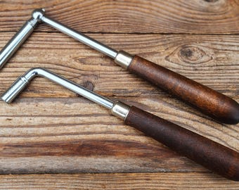 Par de palancas de afinación para piano APSCO con mango de madera, cuello de cisne y cabezal en forma de estrella en forma de L.