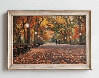 Peut inclure: Impression d'art encadrée représentant une scène de parc en automne. L'œuvre présente un chemin bordé d'arbres aux teintes orange et jaune vives, avec des bancs et des lampadaires. Deux personnages se promènent sur le chemin, et le sol est couvert de feuilles mortes.