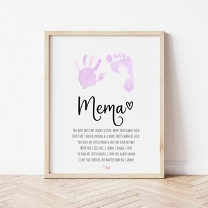 May include: A printable art print with a pink handprint and footprint, a heart, and the text "Mema" and a poem about a grandmother's love.