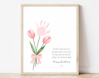 May include: A pink handprint flower bouquet with a pink ribbon and the text "THIS PRETTY FLOWER THAT YOU SEE WAS MADE ESPECIALLY FOR YOU BY ME MY FINGERS MAKE THE PETALS PART SHOWING LOVE FROM ALL MY HEART Happy Birthday"