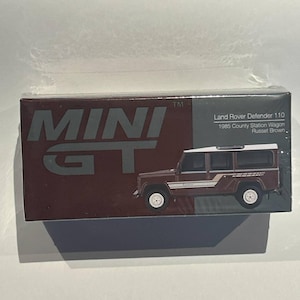 Mini GT 1/64 1985 Land Rover Defender 110 Country Station Wagon, brown