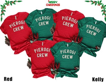 May include: Five Christmas themed t-shirts with the text "Pierogi Crew" in white on a red and green background.