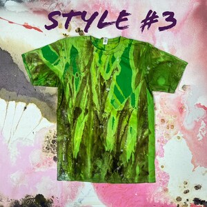 May include: Green and brown tie-dye t-shirt with a faded, abstract pattern. The shirt has a crew neck and short sleeves. Style #3.