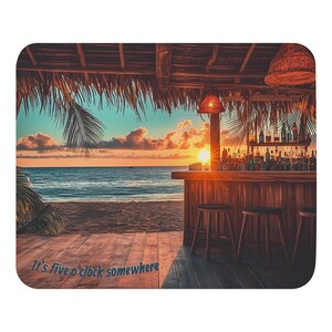 May include: A mousepad depicting a beach bar at sunset. The bar is constructed from wood, with stools and bottles of spirits. The text "It's five o'clock somewhere" is at the bottom. The sky displays orange, yellow, and blue hues.