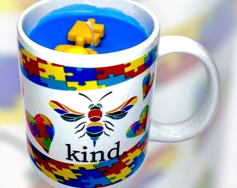 Container candle in sparkling silver coffee cup with hearts in puzzle pieces with Fill my cup Lord script, red with blackberry/vanilla scent