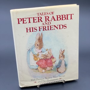 May include: A book titled "Tales of Peter Rabbit and His Friends" with thirteen Beatrix Potter stories and illustrations. The cover features a watercolor illustration of Peter Rabbit and three other rabbits.