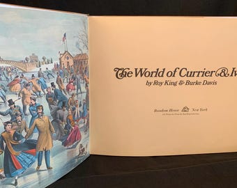May include: An open hardcover book titled The World of Currier & Ives by Roy King & Burke Davis, published by Random House, New York. The left page features a colorful illustration of people ice skating, while the right page displays the title text.