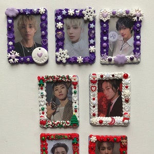 May include: Six decorative photo frames with different designs. The frames are decorated with various embellishments, including snowflakes, stars, hearts, and Christmas-themed decorations. Each frame features a different photo of a person.