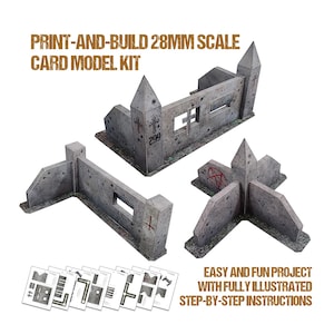 May include: A print-and-build card model kit of a ruined building in 28mm scale. The kit includes three sections of wall, one with a tower, and instructions for assembly. The walls are gray and have details like windows, crosses, and graffiti.