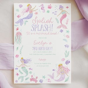 May include: A mermaid-themed birthday invitation with the text "Splish Splash!" and "Evelyn's 3rd Birthday!" in pink and purple. The invitation features illustrations of mermaids, sea creatures, and floral accents on a white background.