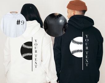 May include: Two white hoodies with black baseball graphics and the text "YOUR TEXT" on the back. One hoodie has the number "#9" on the front.