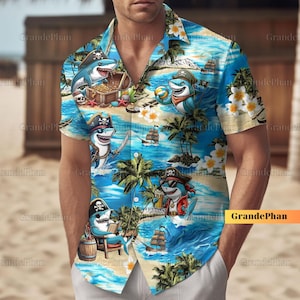 May include: A blue and white Hawaiian shirt featuring a pattern of cartoon pirate sharks, palm trees, and treasure chests. The shirt has a button-down collar and short sleeves.