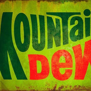 May include: A vintage-style sign with the words "Mountain Dew" in large, bold letters. The word "Mountain" is in green, and "Dew" is in red. The background is a distressed, faded green.