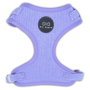 May include: A lavender dog harness with a ribbed texture. The harness has a black patch with a bone icon and the text "Sit Steve".