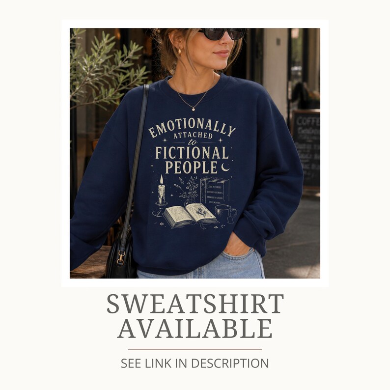 May include: A navy blue sweatshirt featuring the phrase "Emotionally Attached to Fictional People" and a graphic of a candle, books, and a coffee cup. This is part of a clothing range.
